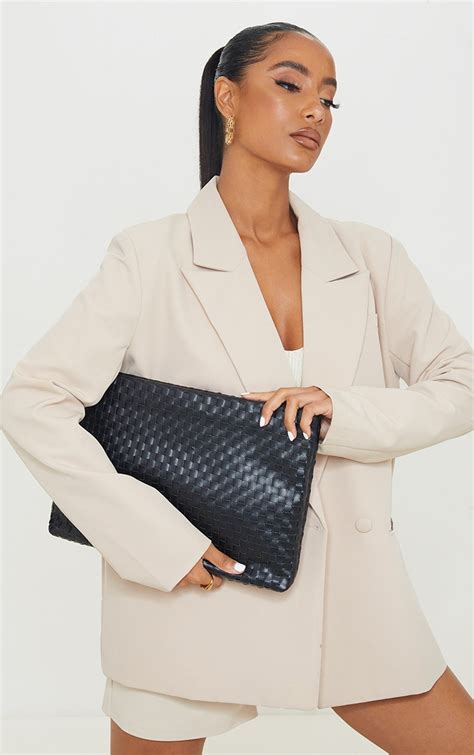 oversized black clutch bag